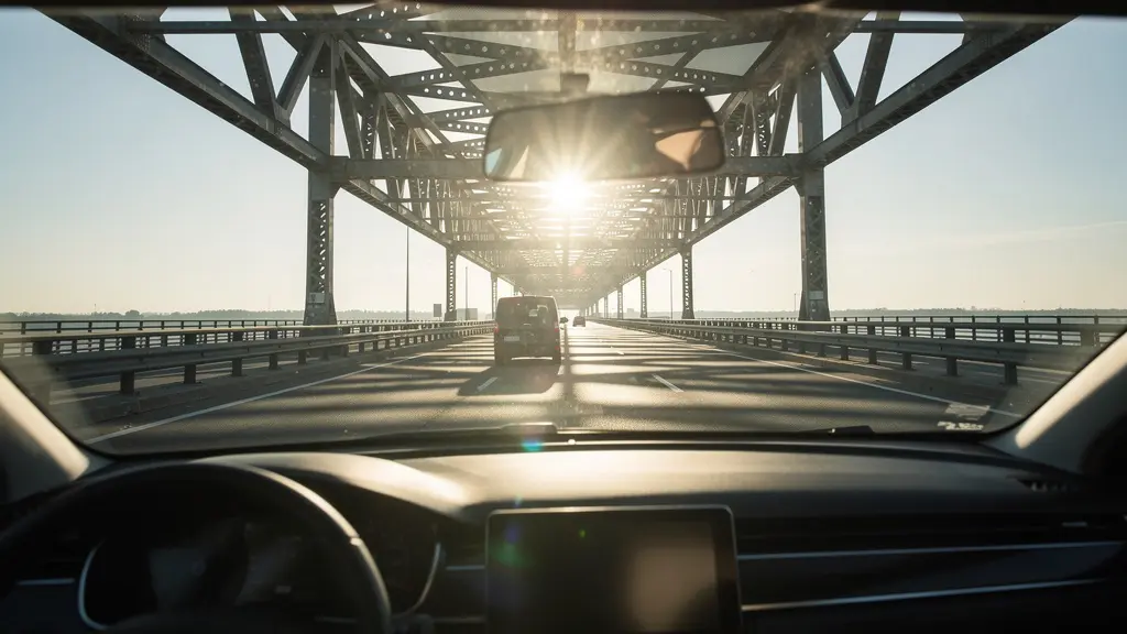 Car sensors misinterpreting environmental conditions on a highway, leading to a phantom braking event.